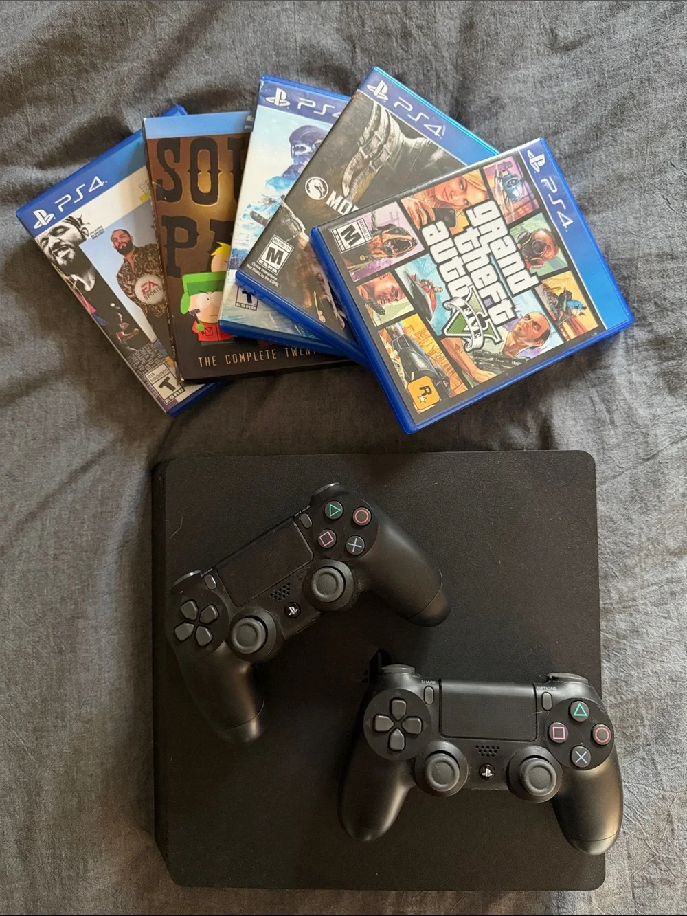 Sony PS4 Slim Black Console with Two Black DualShock Controllers and Games/cords